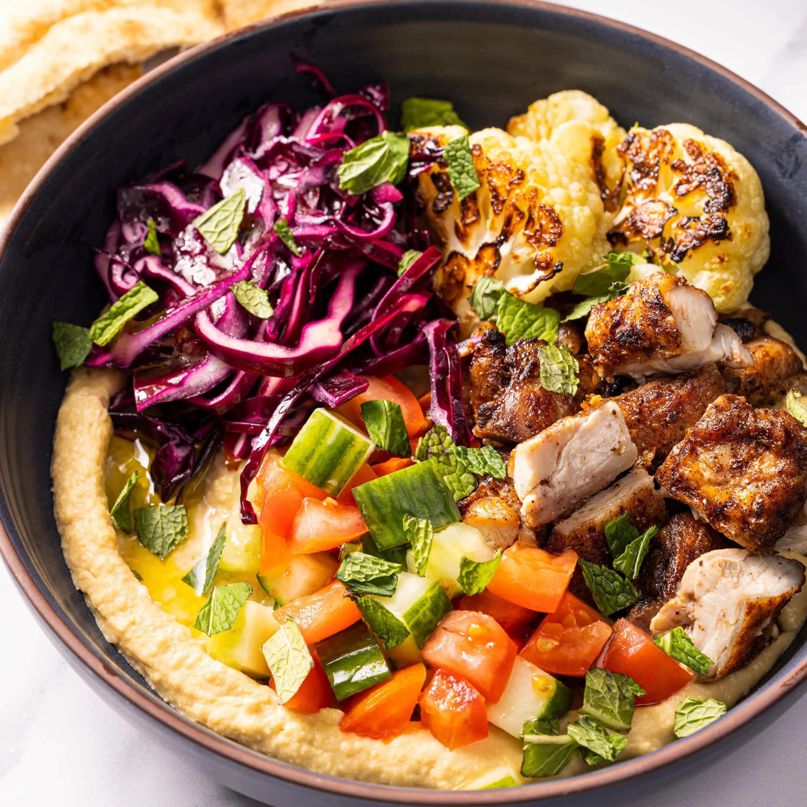 Image of Hummus Bowls with Roasted Chicken and Cauliflower recipe