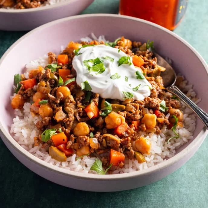 Image of Rice Bowls with Harissa Beef, Chickpeas, and Olives recipe