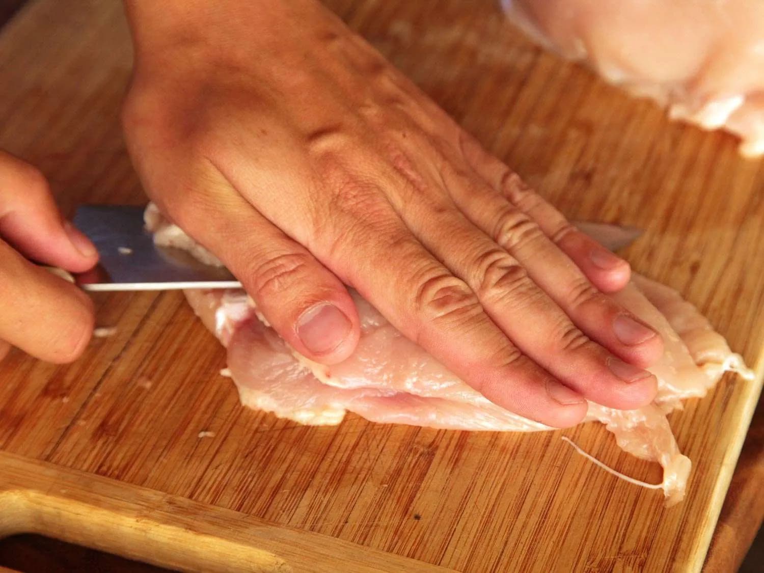 Step 1 of Chicken Parmesan